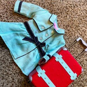 American Girl travel jacket, suitcase, and travel journal.